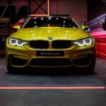yellow BMW car