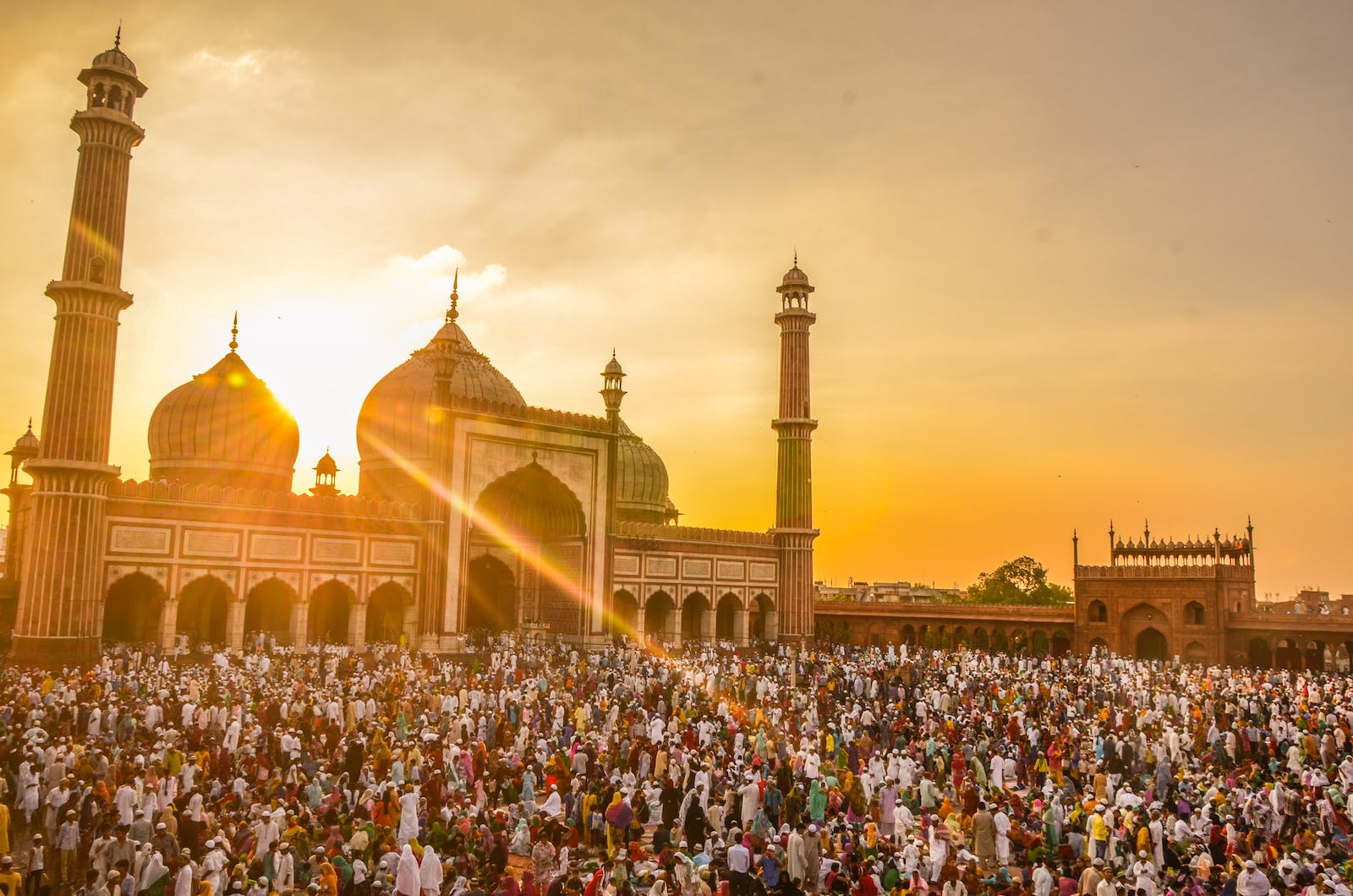 Photo Of People In Front Of Mosque During Golden Hour